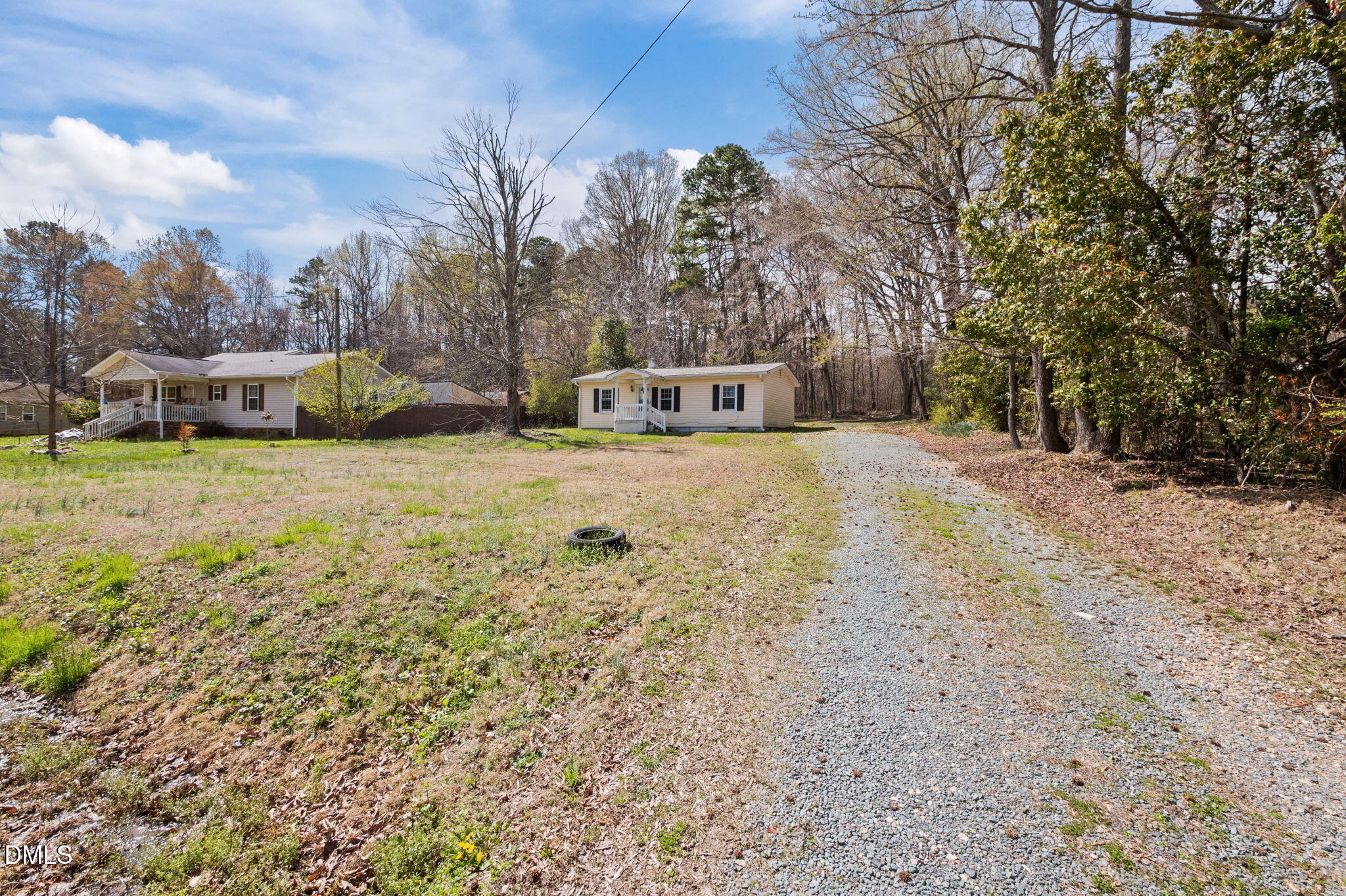 560 Harper Road Hillsborough, NC 27278 - Photo 38 of 44 a front view of a house with a yard and trees