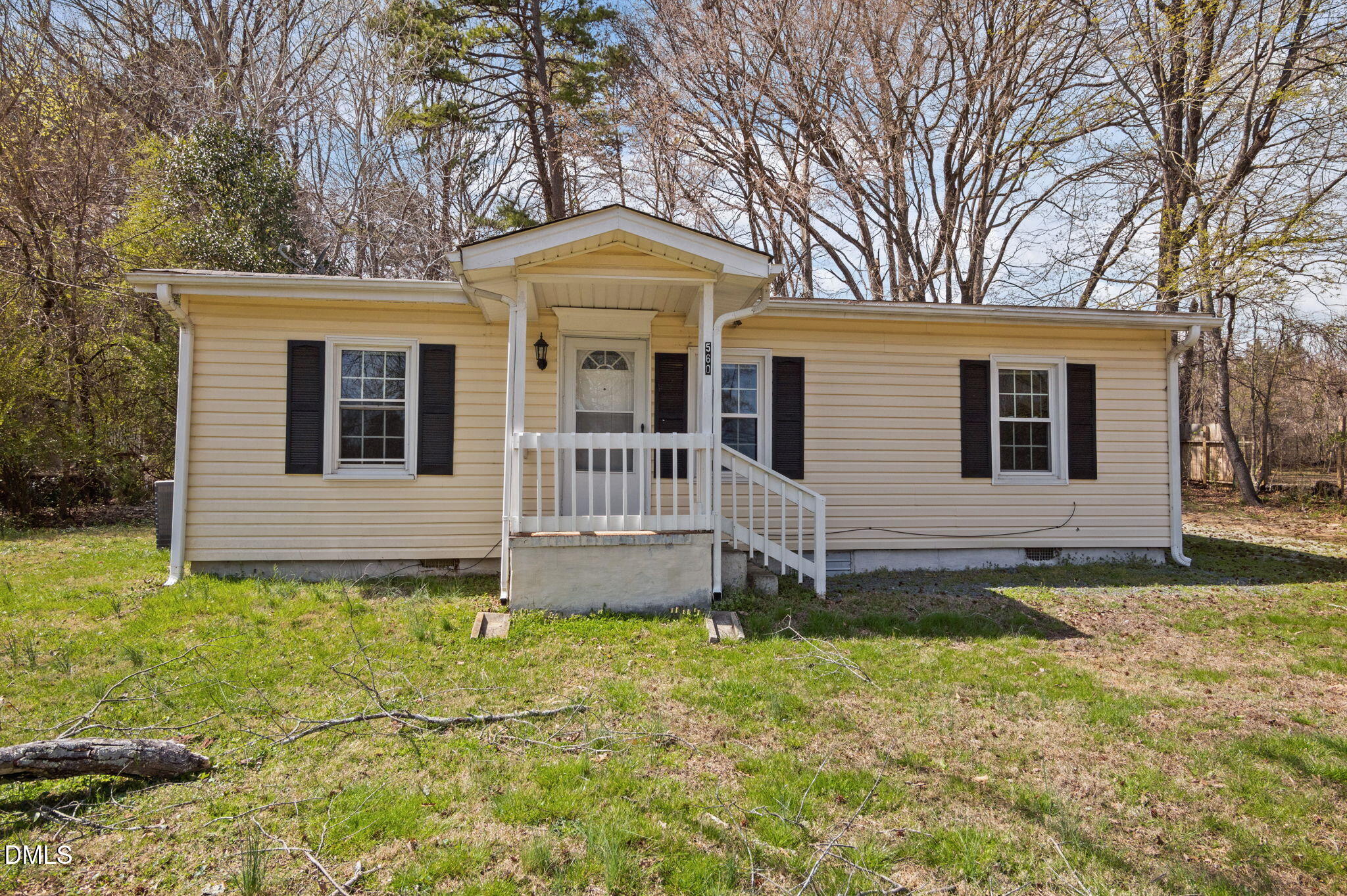 560 Harper Road Hillsborough, NC 27278 - Photo 5 of 44 a front view of a house with a yard