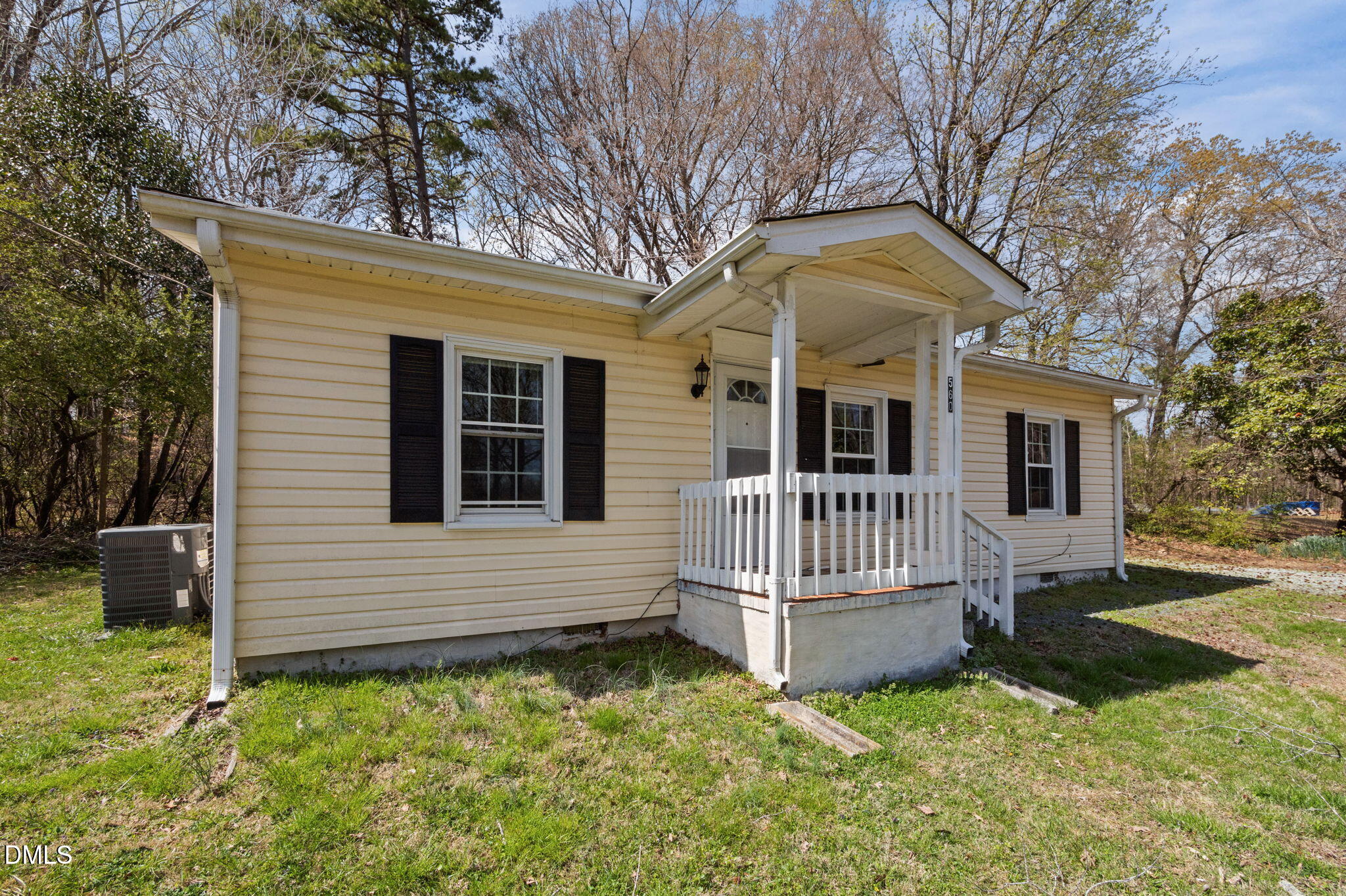 560 Harper Road Hillsborough, NC 27278 - Photo 6 of 44 a front view of a house with a yard