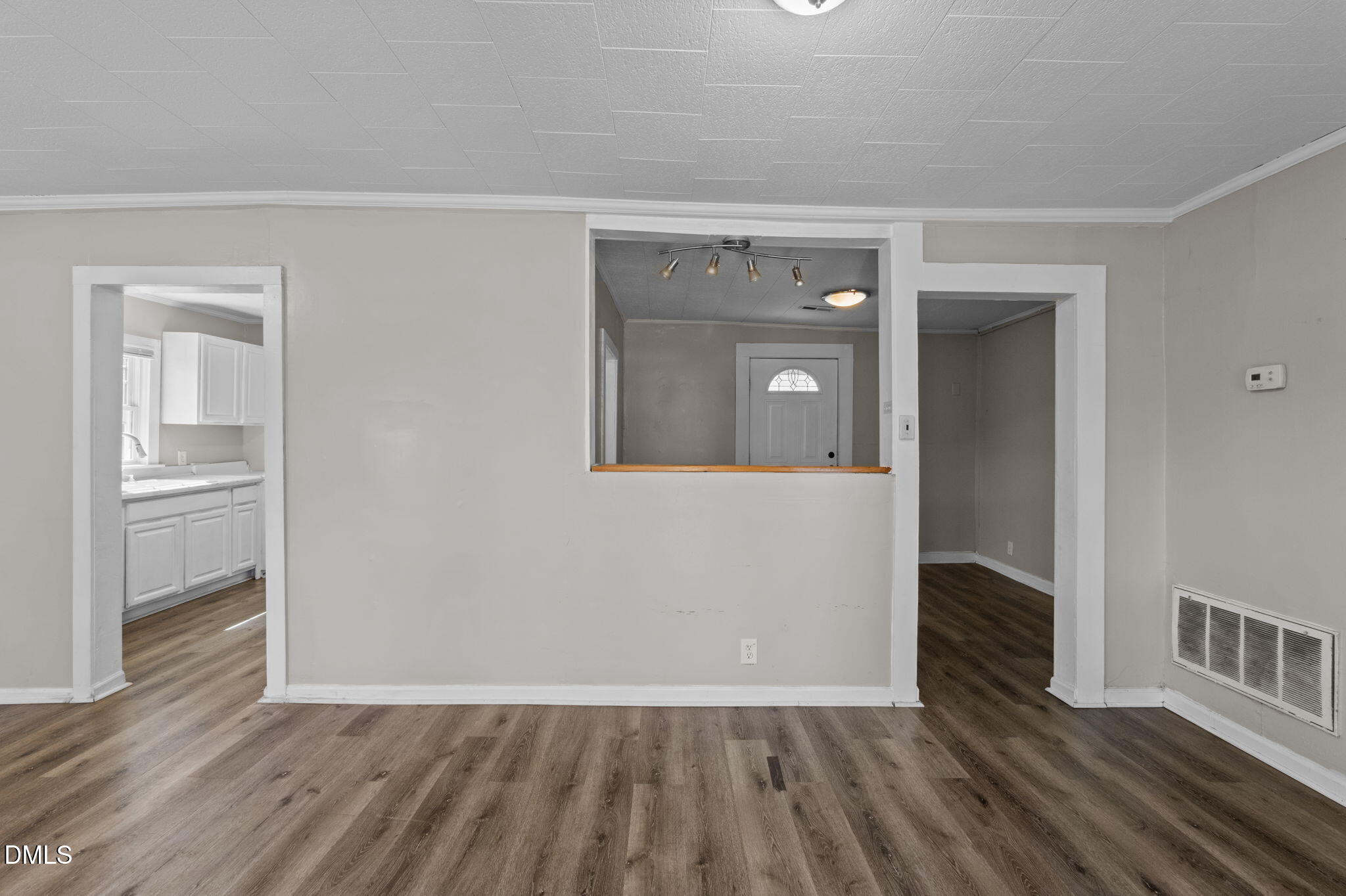560 Harper Road Hillsborough, NC 27278 - Photo 7 of 44 wooden floor in an empty room with a window