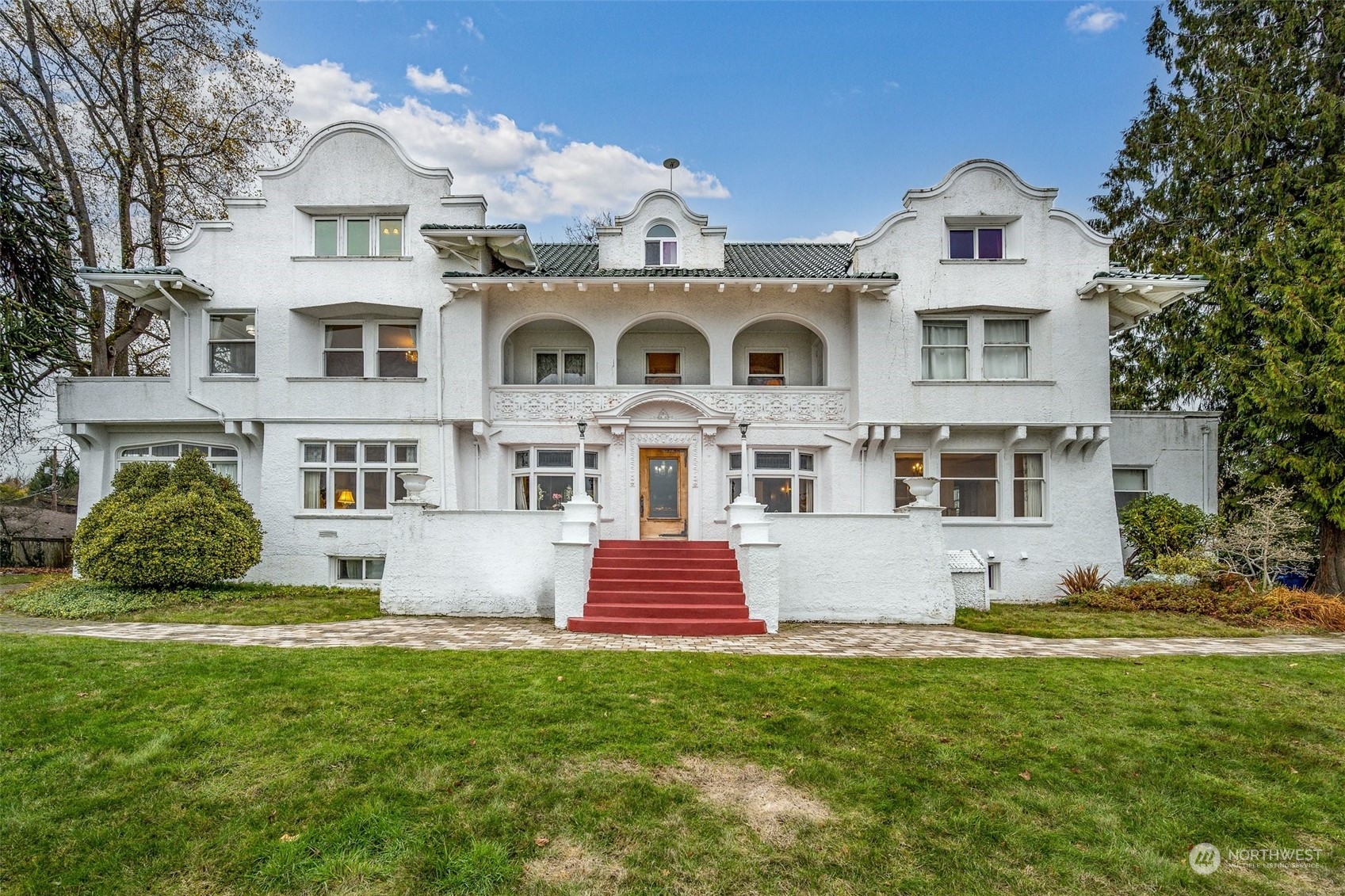 6601 Northeast Windermere Road Seattle, WA 98115 - Photo 12 of 29 a front view of a house with a yard