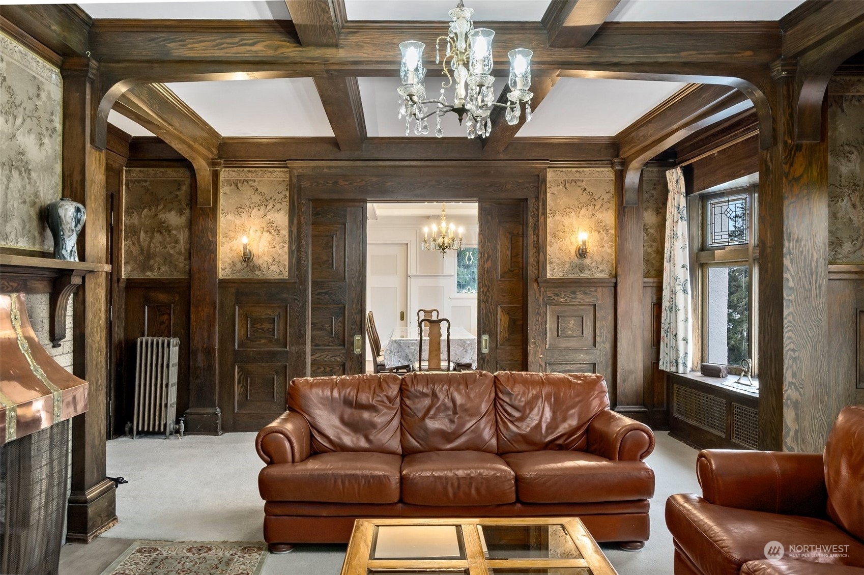 6601 Northeast Windermere Road Seattle, WA 98115 - Photo 19 of 29 a living room with furniture and a chandelier