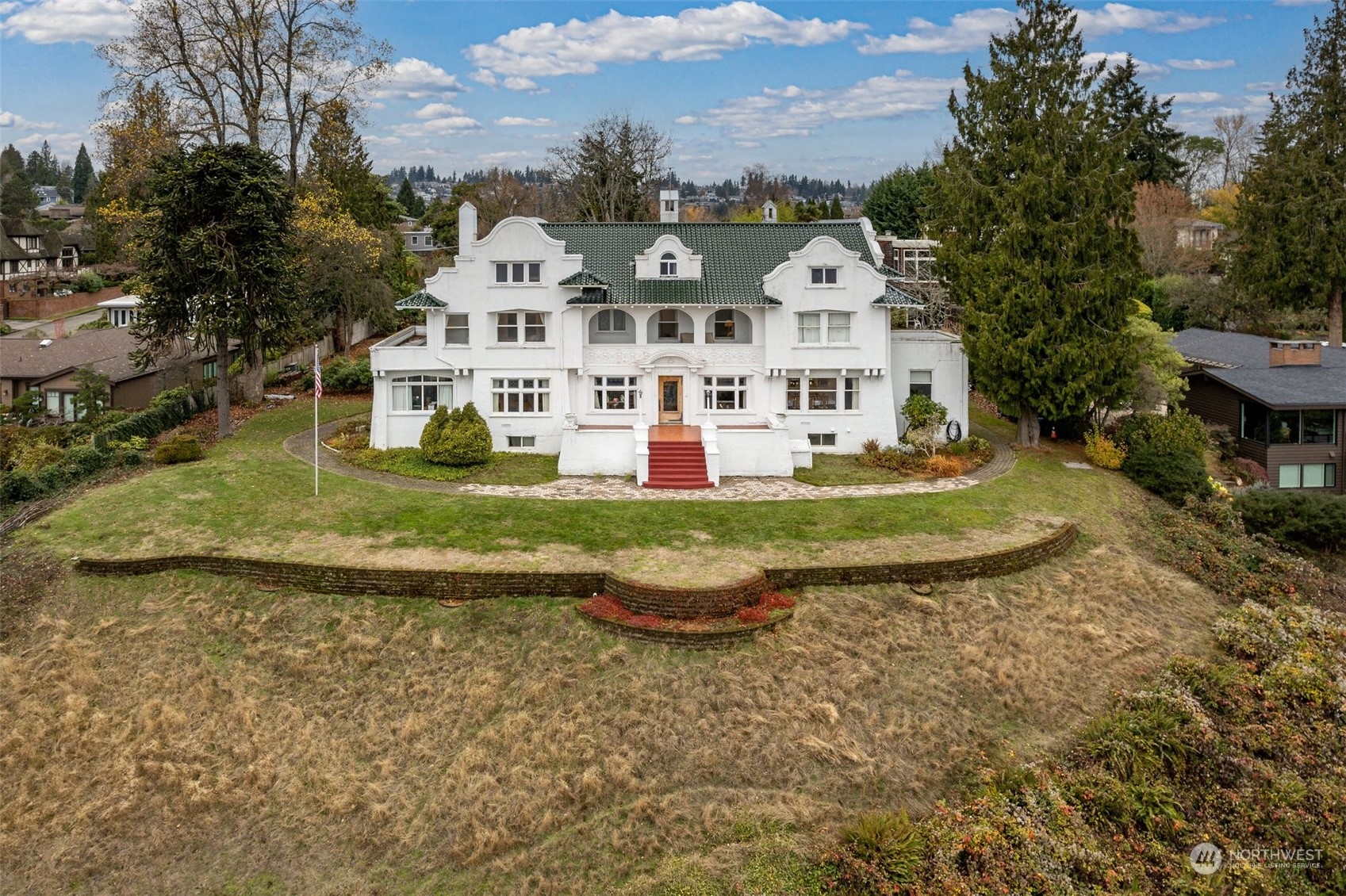 6601 Northeast Windermere Road Seattle, WA 98115 - Photo 2 of 29 a front view of a house with a yard