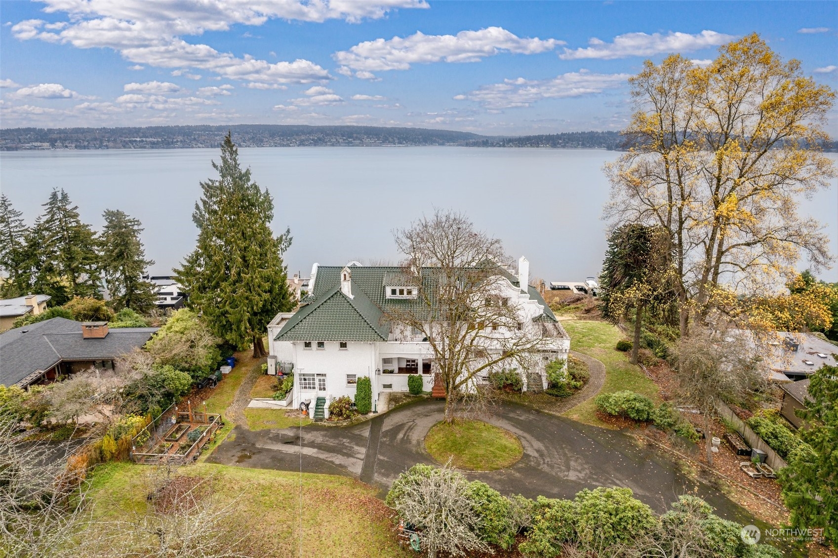 6601 Northeast Windermere Road Seattle, WA 98115 - Photo 8 of 29 a view of a lake with a mountain in the background