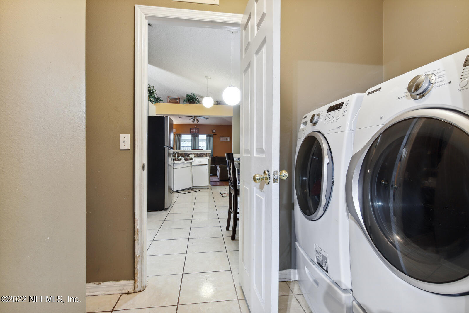 7354 High Bluff Road North Jacksonville, FL 32244 - Photo 23 of 26 a utility room with dryer and washer