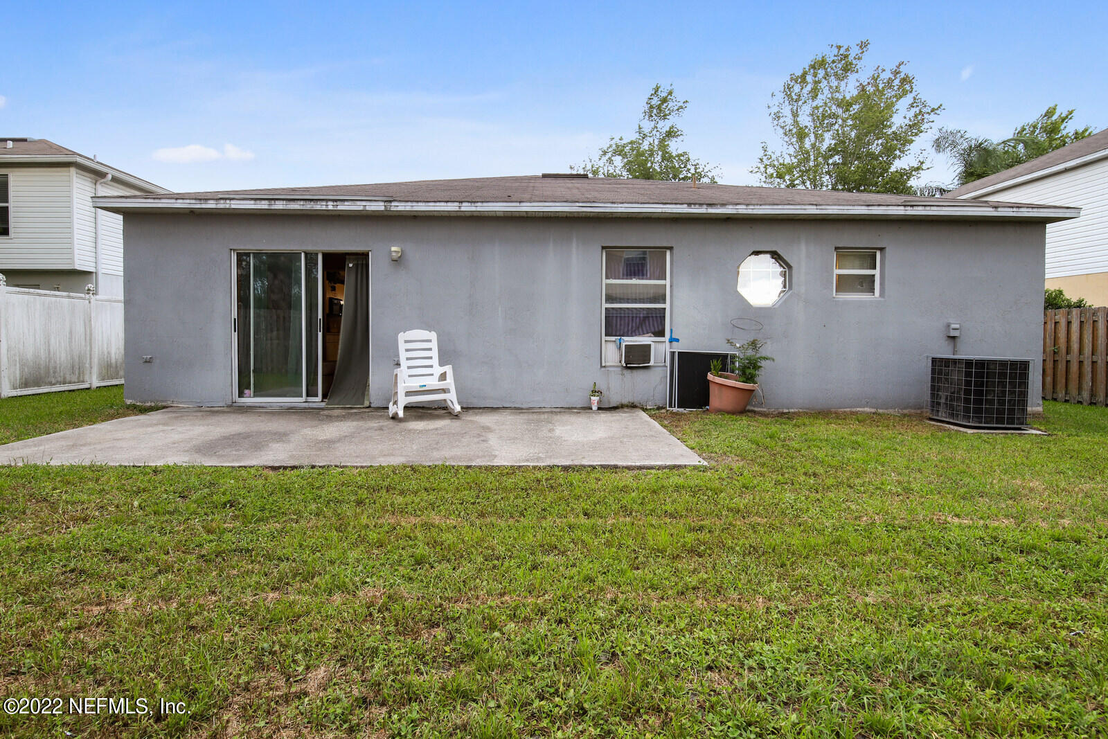 7354 High Bluff Road North Jacksonville, FL 32244 - Photo 24 of 26 a front view of a house with a garden