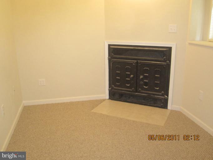 517 Riggs Court Frederick, MD 21703 - Photo 20 of 30 Basement Room for office w/fire place
