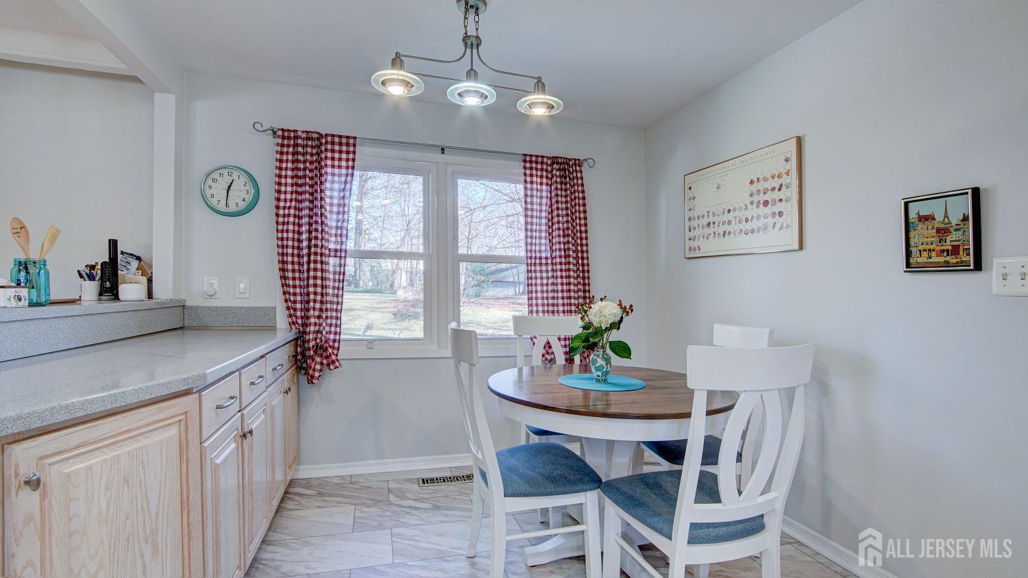 38 Mistletoe Drive Old Bridge, NJ 07747 - Photo 15 of 41 a view of a dining room with furniture window and wooden floor