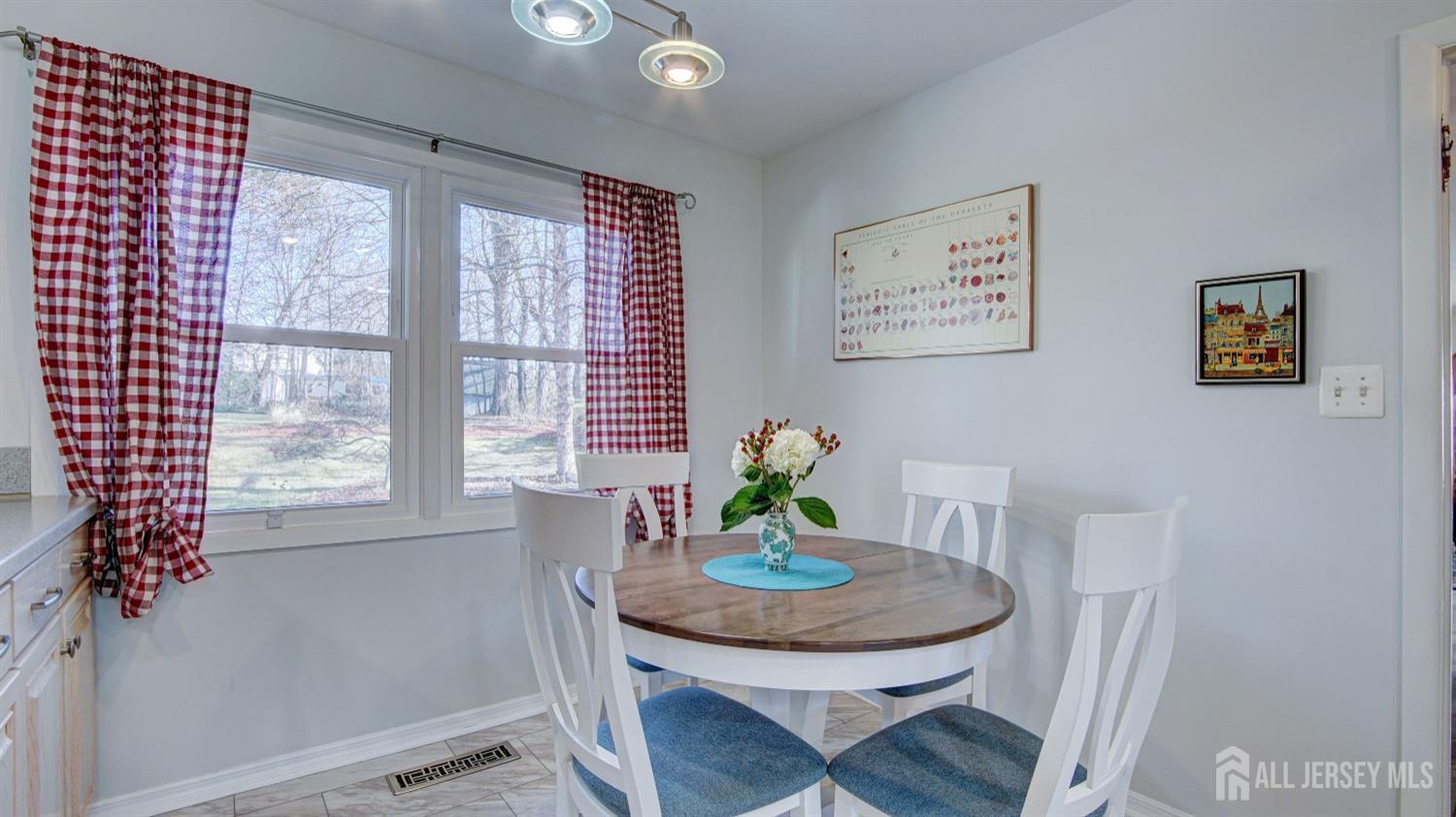 38 Mistletoe Drive Old Bridge, NJ 07747 - Photo 16 of 41 a view of a dining room with furniture window and wooden floor