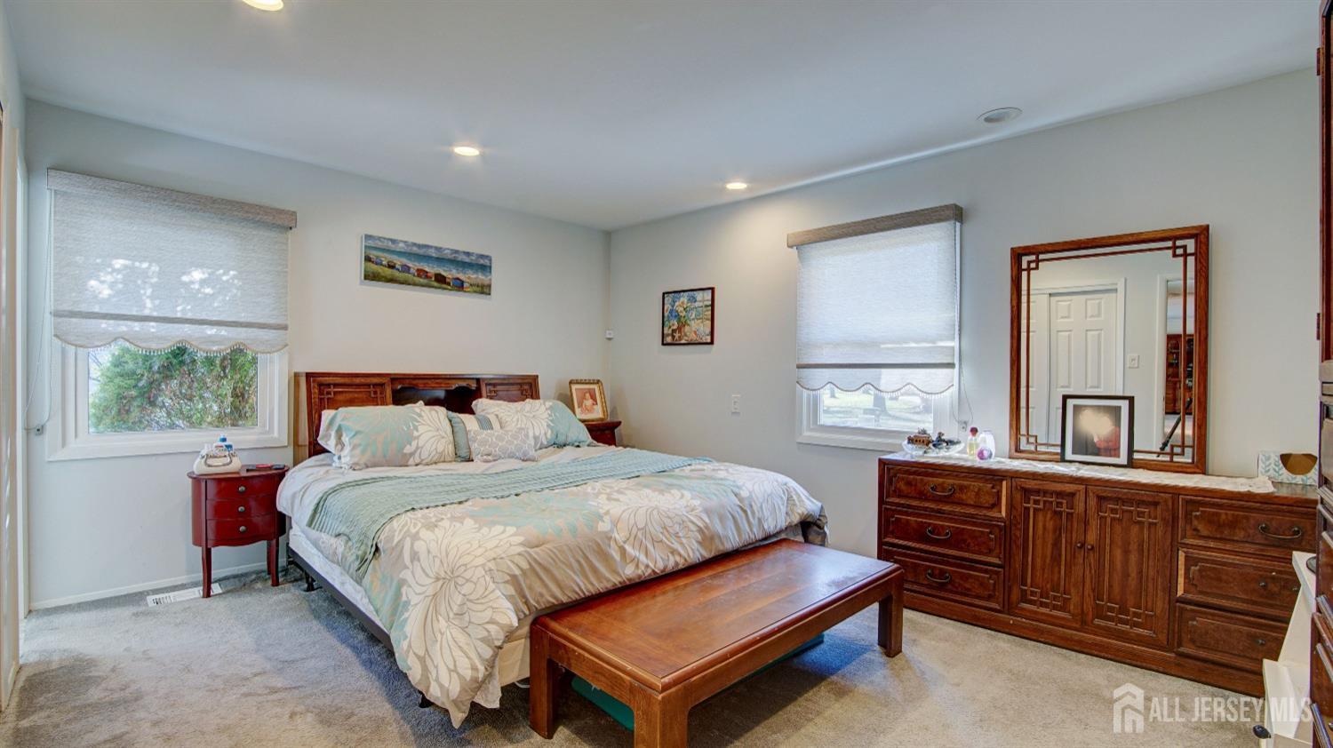 38 Mistletoe Drive Old Bridge, NJ 07747 - Photo 26 of 41 a bed room with a bed and a dresser