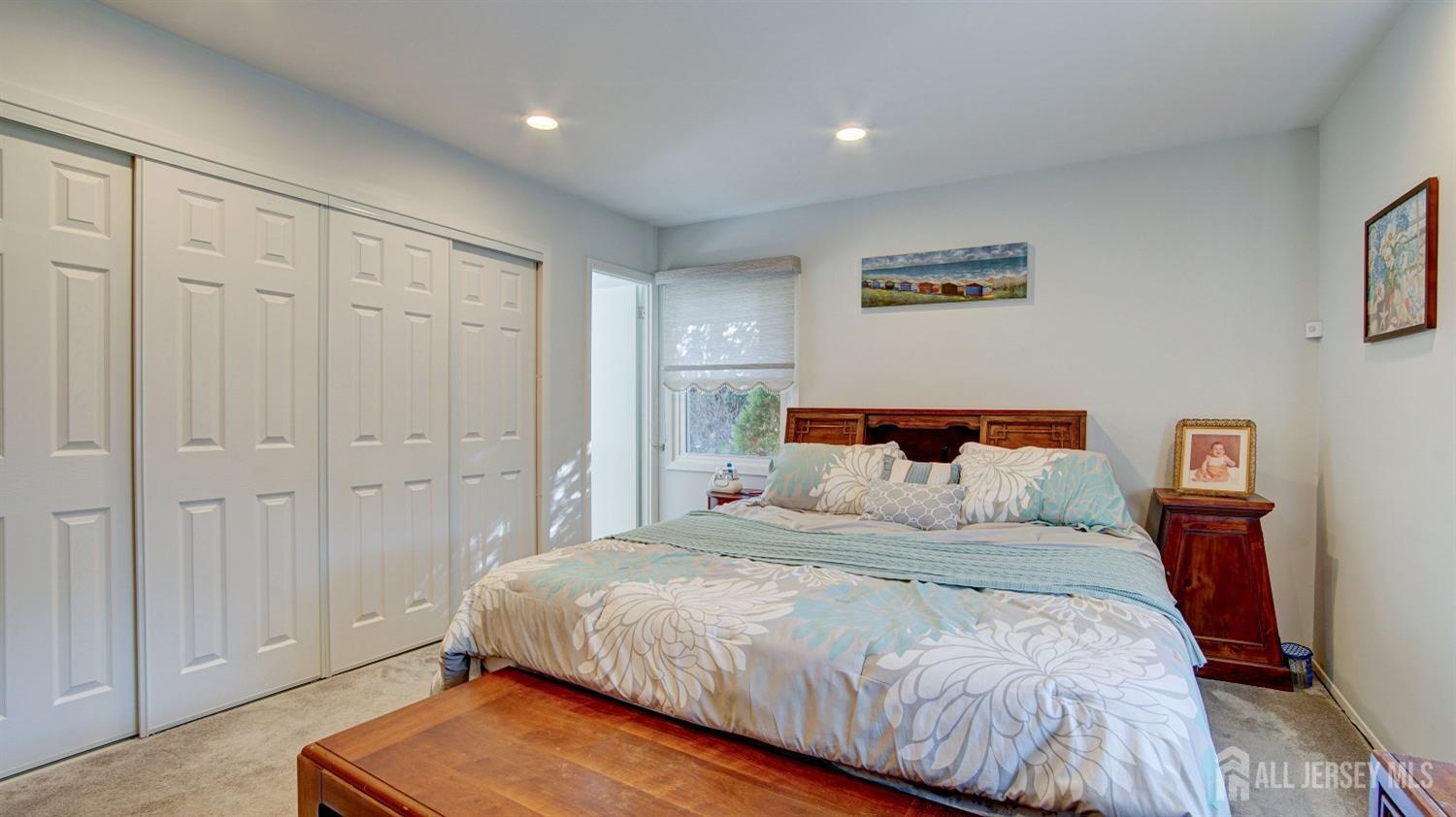38 Mistletoe Drive Old Bridge, NJ 07747 - Photo 27 of 41 a bedroom with a bed and a night stand