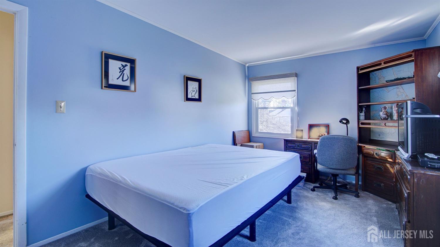 38 Mistletoe Drive Old Bridge, NJ 07747 - Photo 29 of 41 a bed room with a bed and furniture