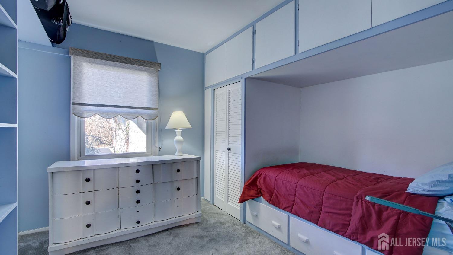 38 Mistletoe Drive Old Bridge, NJ 07747 - Photo 30 of 41 a bedroom with a bed and a window