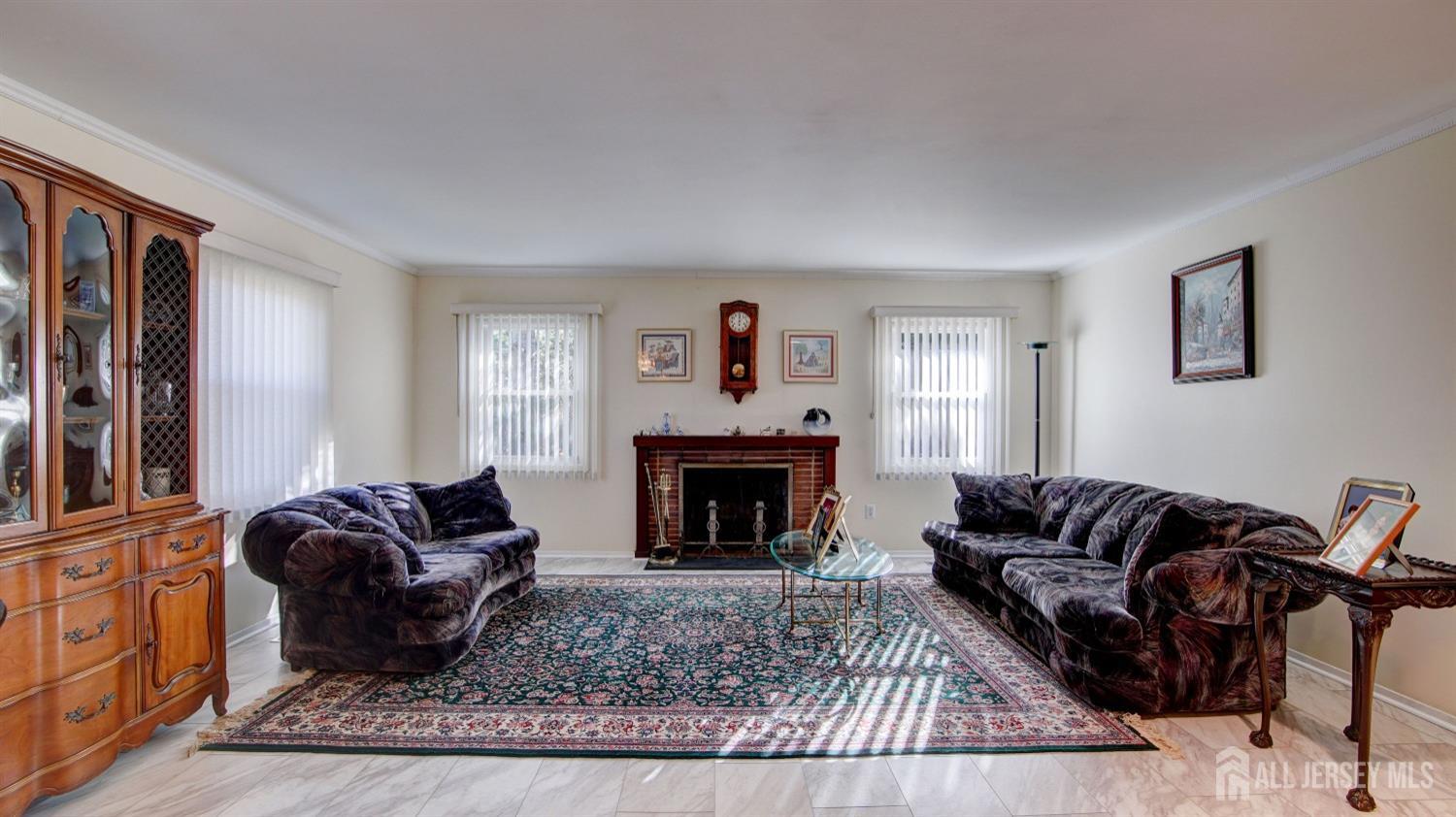 38 Mistletoe Drive Old Bridge, NJ 07747 - Photo 9 of 41 a living room with furniture a rug a fireplace and a window