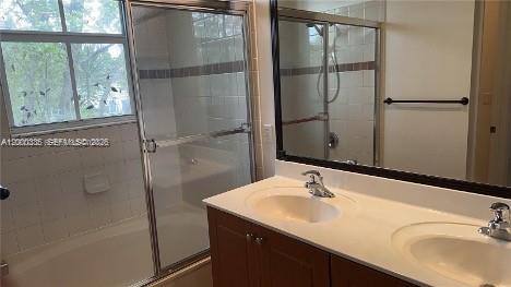 2851 Prospect Road, Unit 1211 Tamarac, FL 33309 - Photo 12 of 15 a bathroom with a sink and mirror