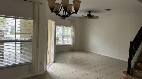 2851 Prospect Road, Unit 1211 Tamarac, FL 33309 - Photo 6 of 15 a view of empty room with windows