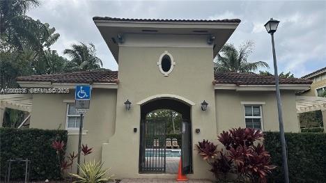 2851 Prospect Road, Unit 1211 Tamarac, FL 33309 - Photo 9 of 15 a front view of a house