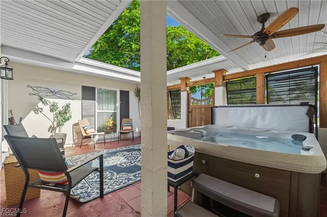 a dining room with furniture and a garden