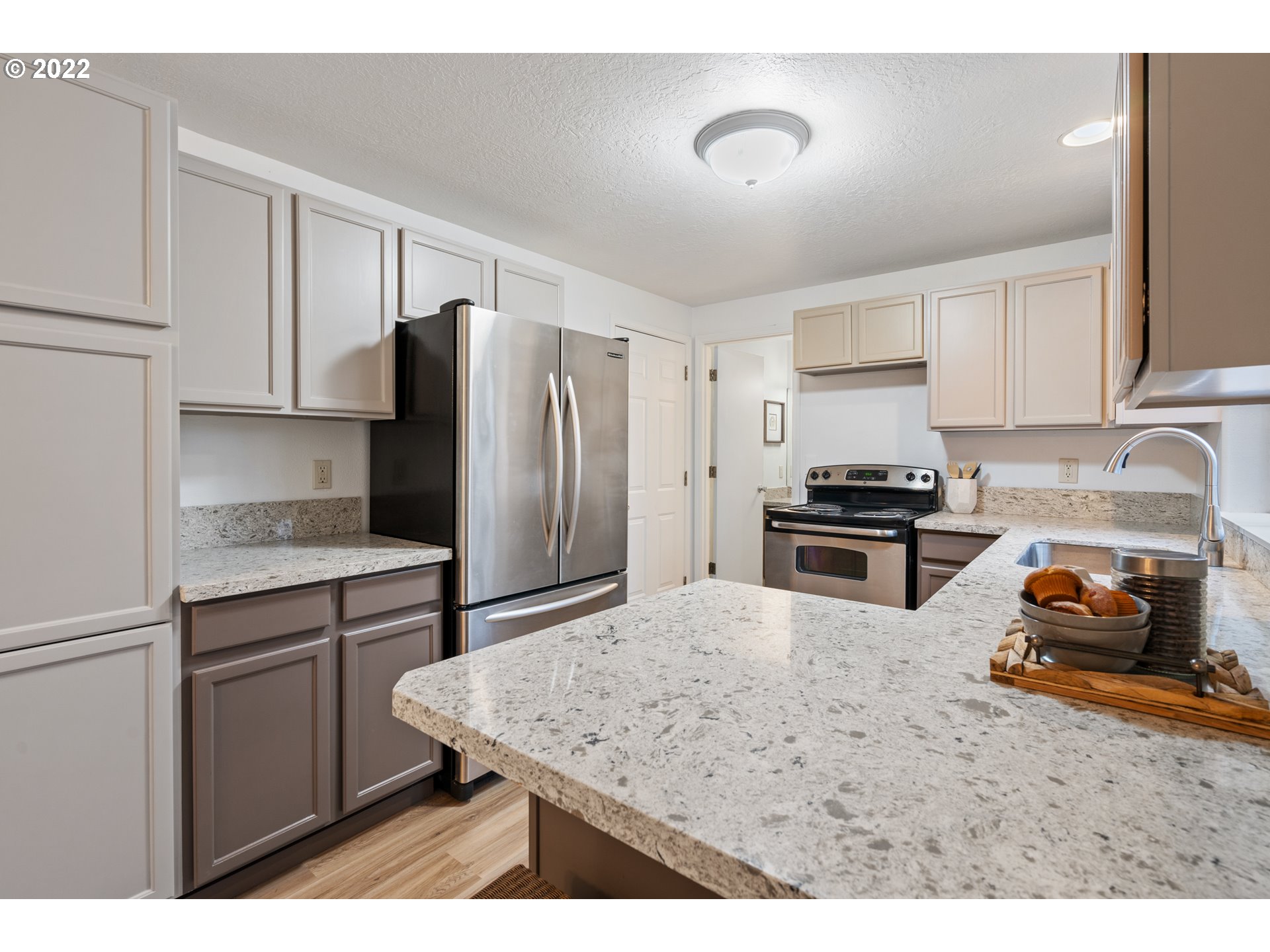 4525 North Colonial Avenue Portland, OR 97217 - Photo 11 of 35 a kitchen with a refrigerator sink and stove