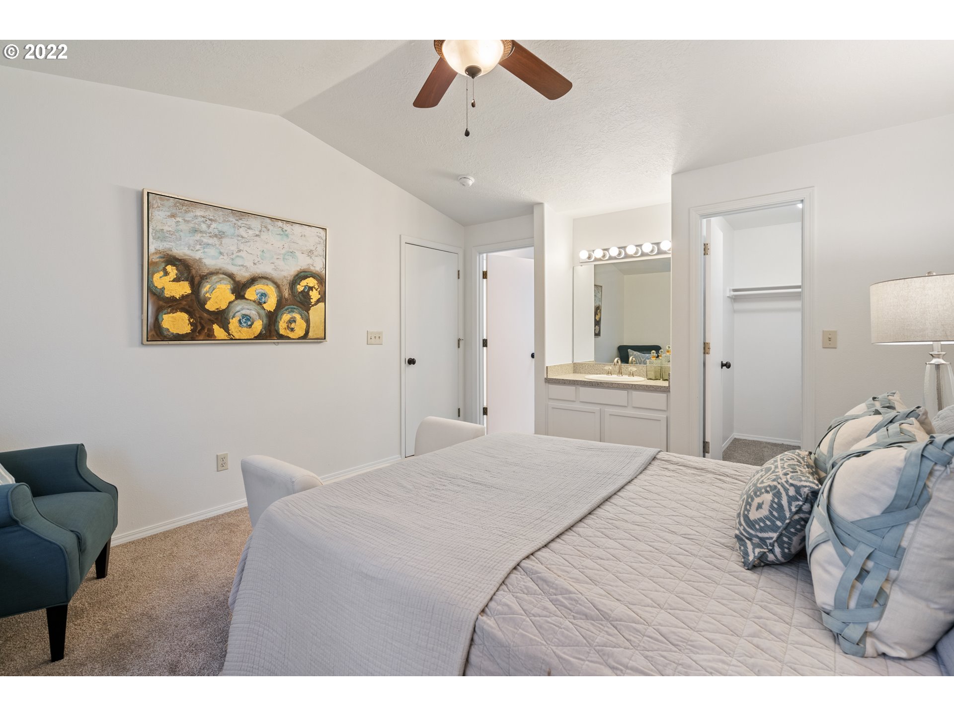 4525 North Colonial Avenue Portland, OR 97217 - Photo 22 of 35 a bedroom with a bed and a painting on the wall