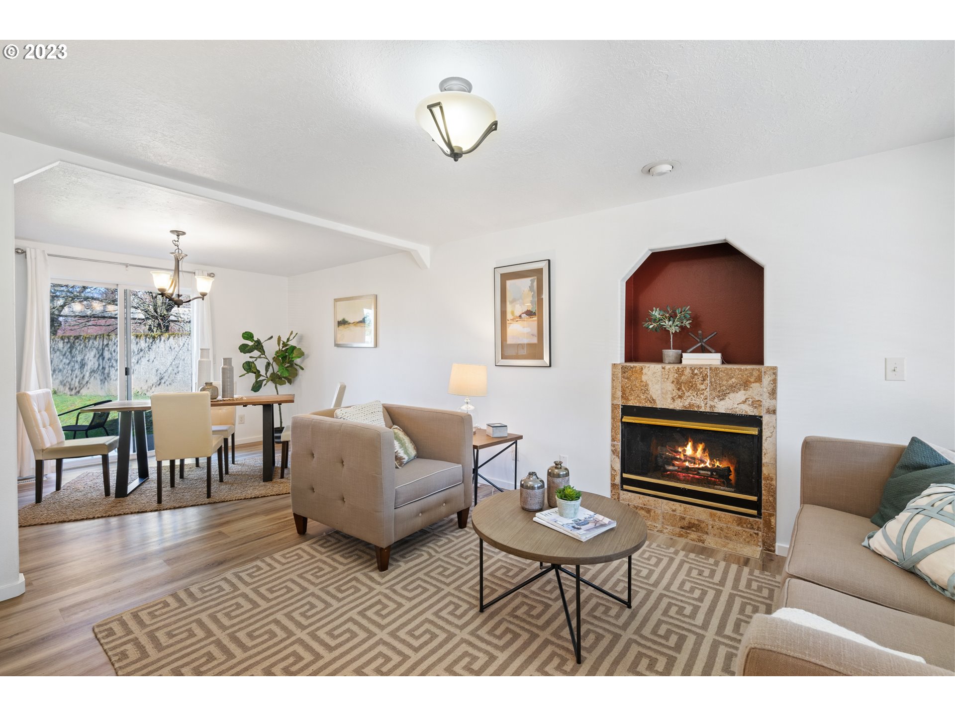4525 North Colonial Avenue Portland, OR 97217 - Photo 6 of 35 a living room with furniture and a fireplace
