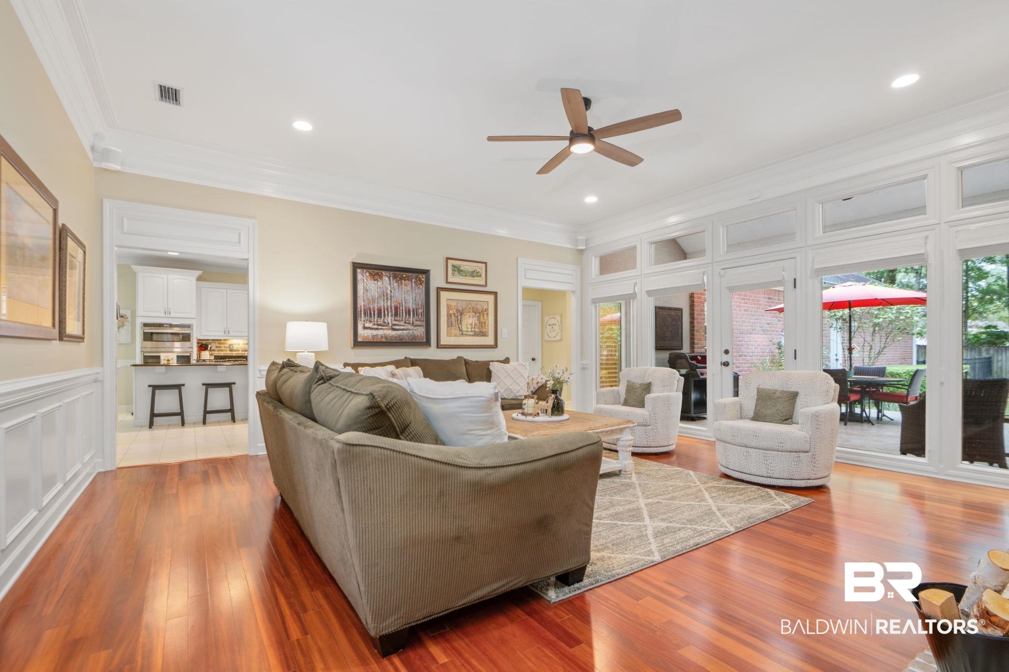 105 Beaver Dam Road Fairhope, AL 36532 - Photo 4 of 55 Living room with light wood-type flooring, ceiling fan, and crown molding