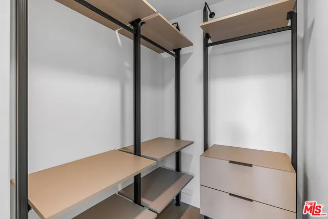 a view of a hallway with workspace