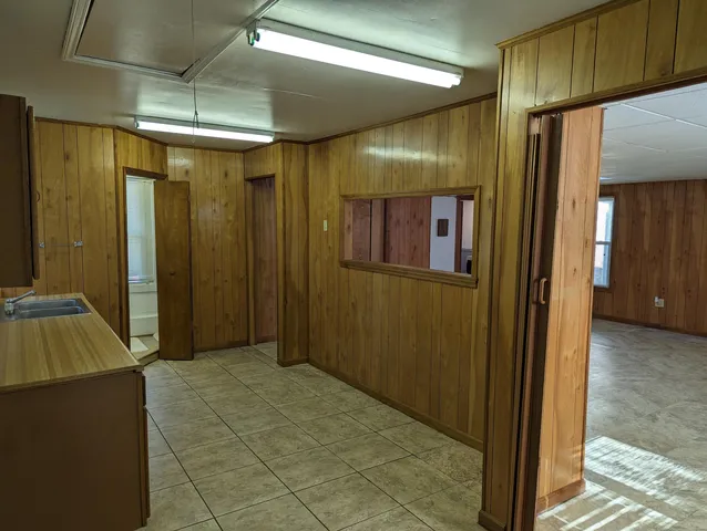 en empty room with windows