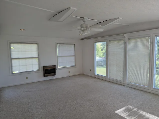 a bathroom with a double vanity sink and mirror