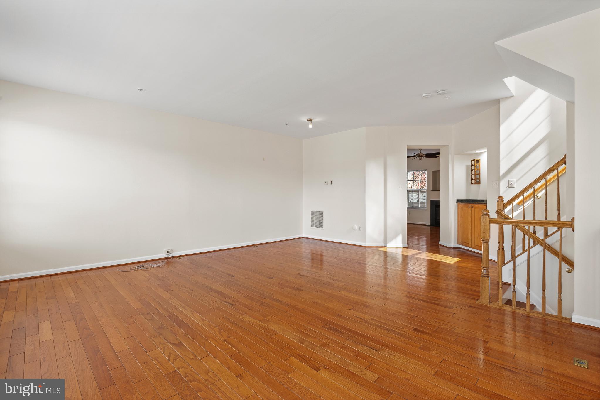 70 Two Rivers Drive Edgewater, MD 21037 - Photo 28 of 69 Spacious room with warm wood floors.
