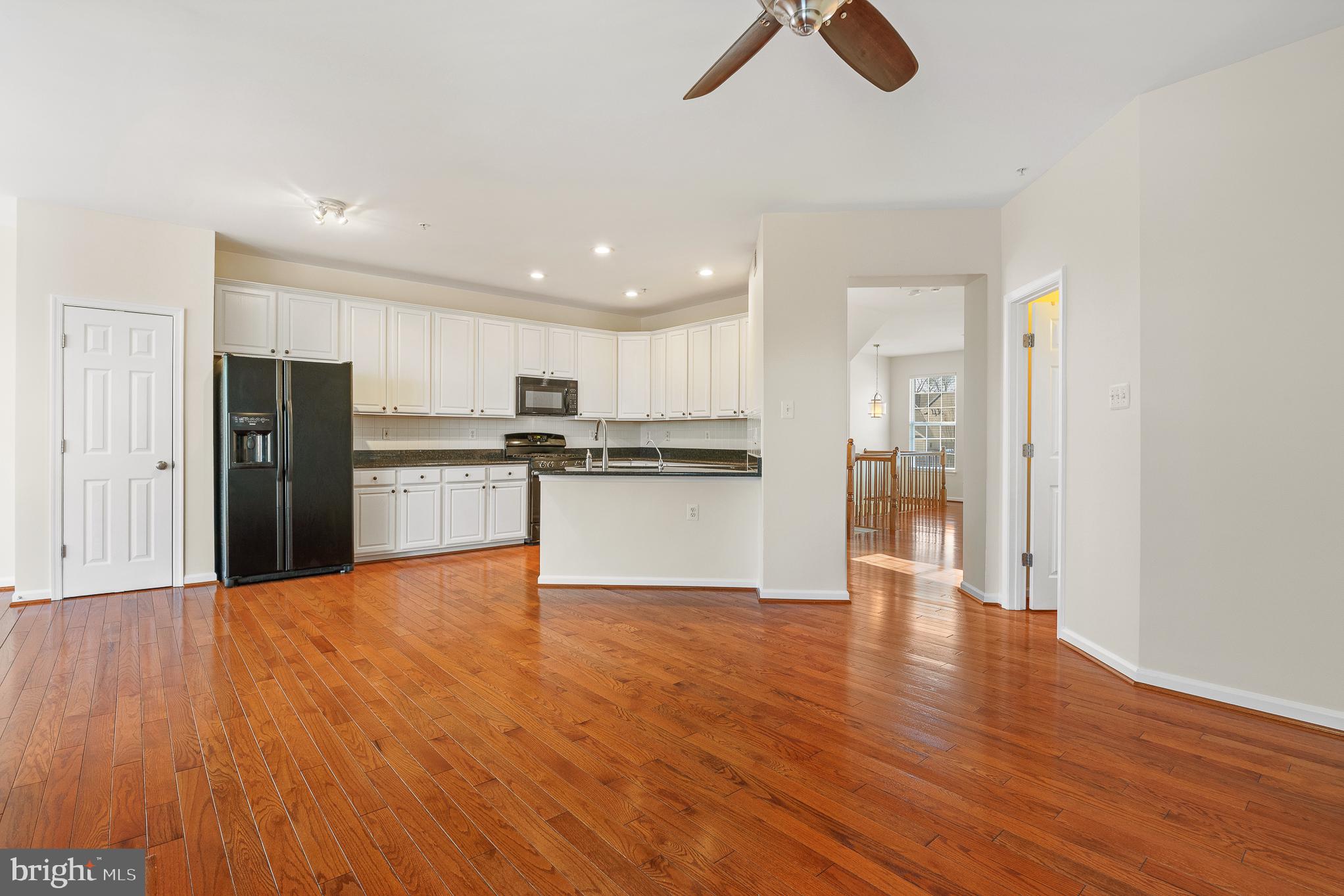 70 Two Rivers Drive Edgewater, MD 21037 - Photo 33 of 69 Spacious kitchen with warm wood floors.
