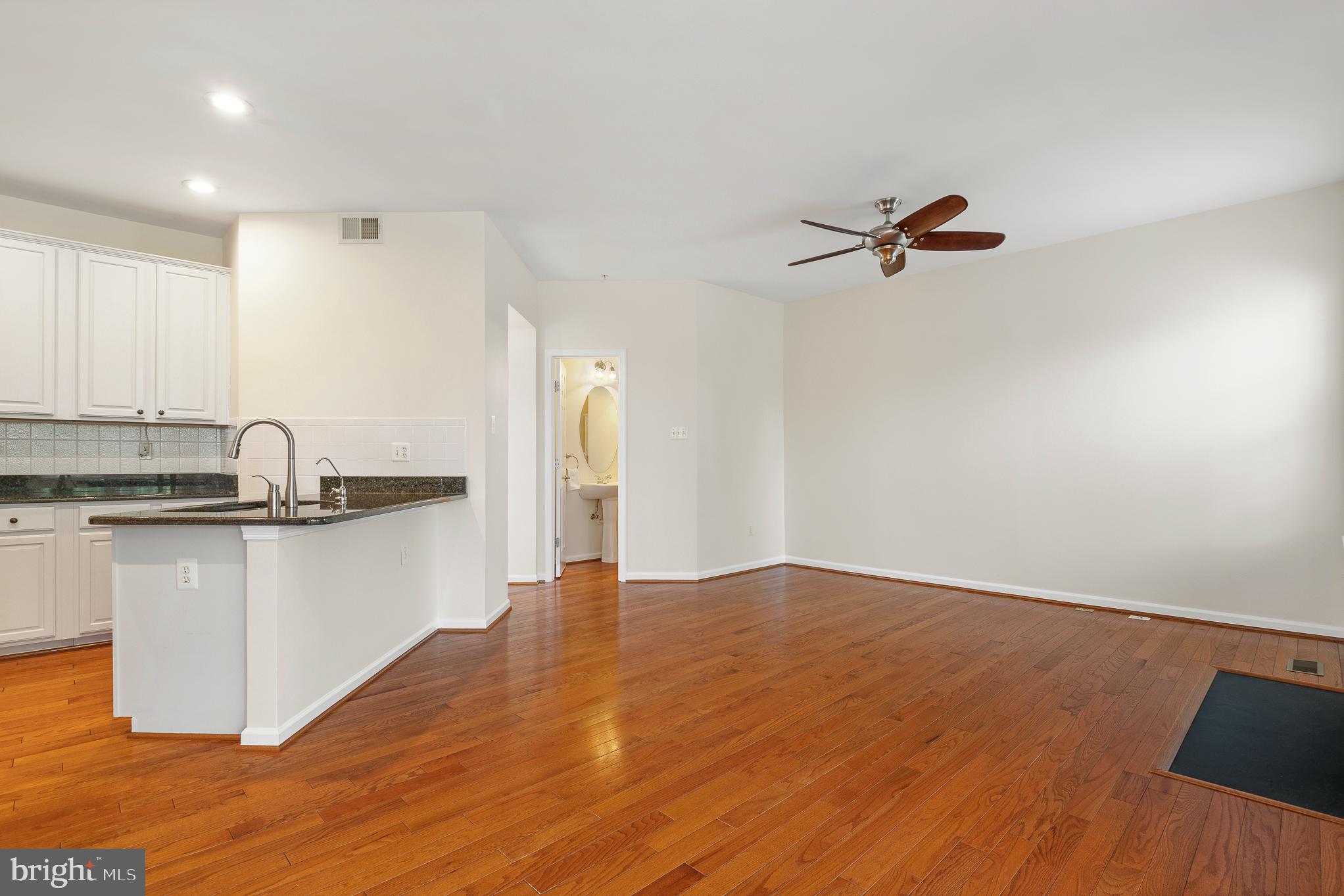 70 Two Rivers Drive Edgewater, MD 21037 - Photo 34 of 69 Spacious living area with warm tones.