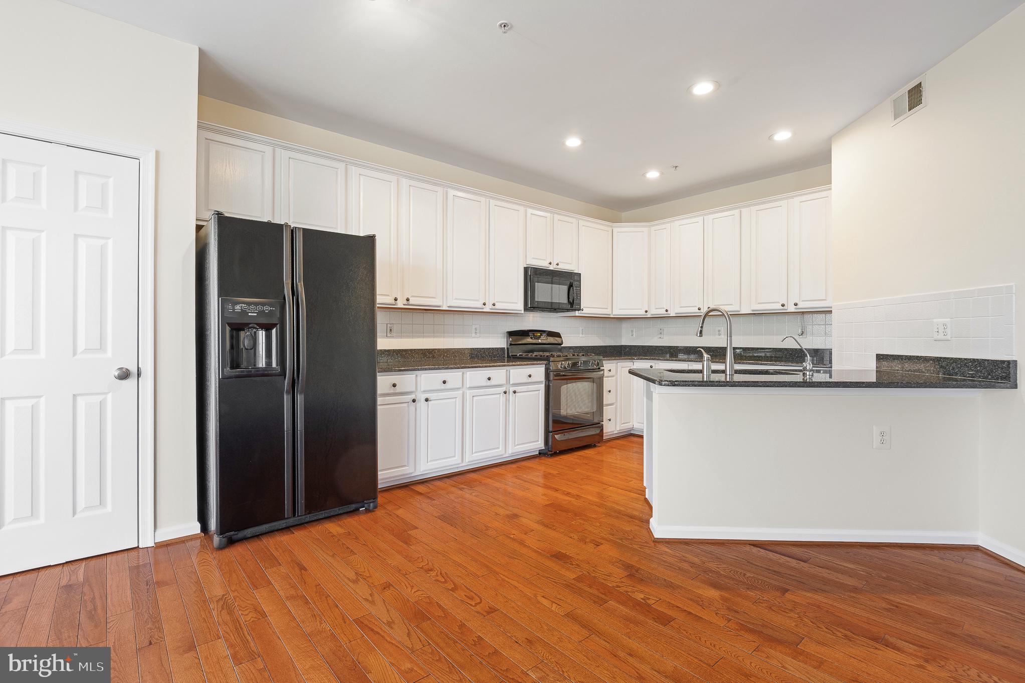 70 Two Rivers Drive Edgewater, MD 21037 - Photo 35 of 69 Modern kitchen with sleek finishes.