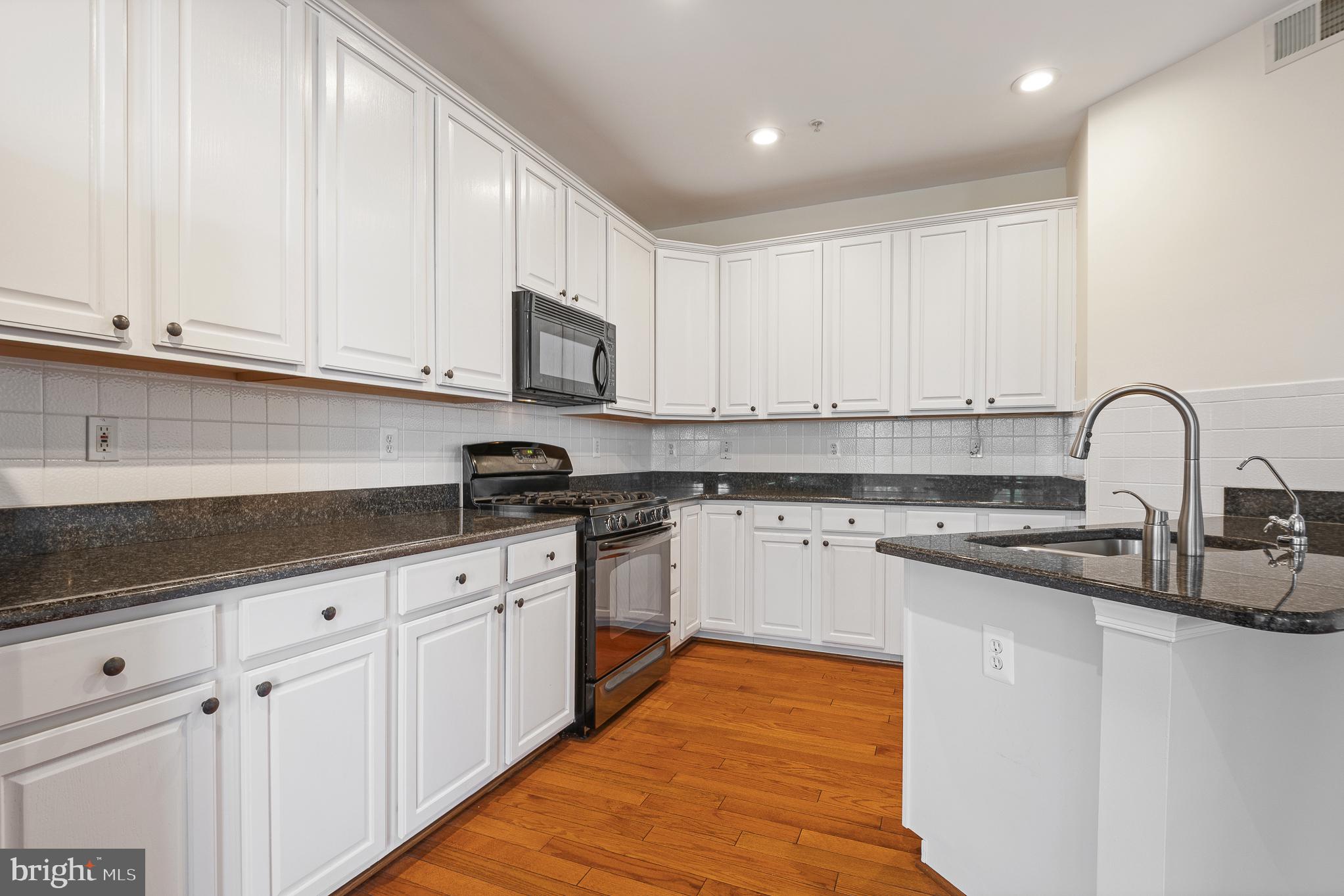 70 Two Rivers Drive Edgewater, MD 21037 - Photo 36 of 69 Modern kitchen with sleek finishes.