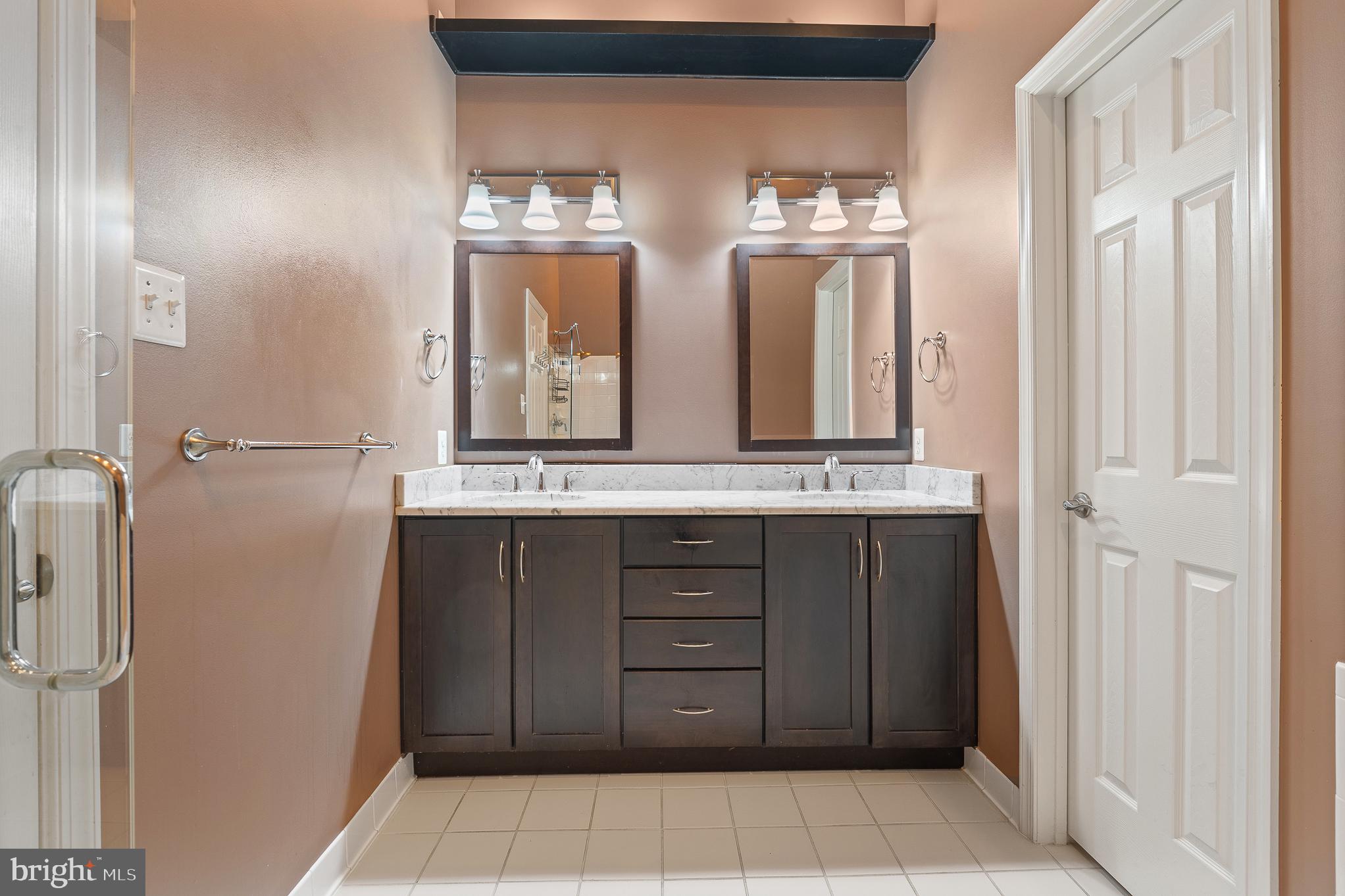 70 Two Rivers Drive Edgewater, MD 21037 - Photo 45 of 69 Elegant dual-sink bathroom retreat.