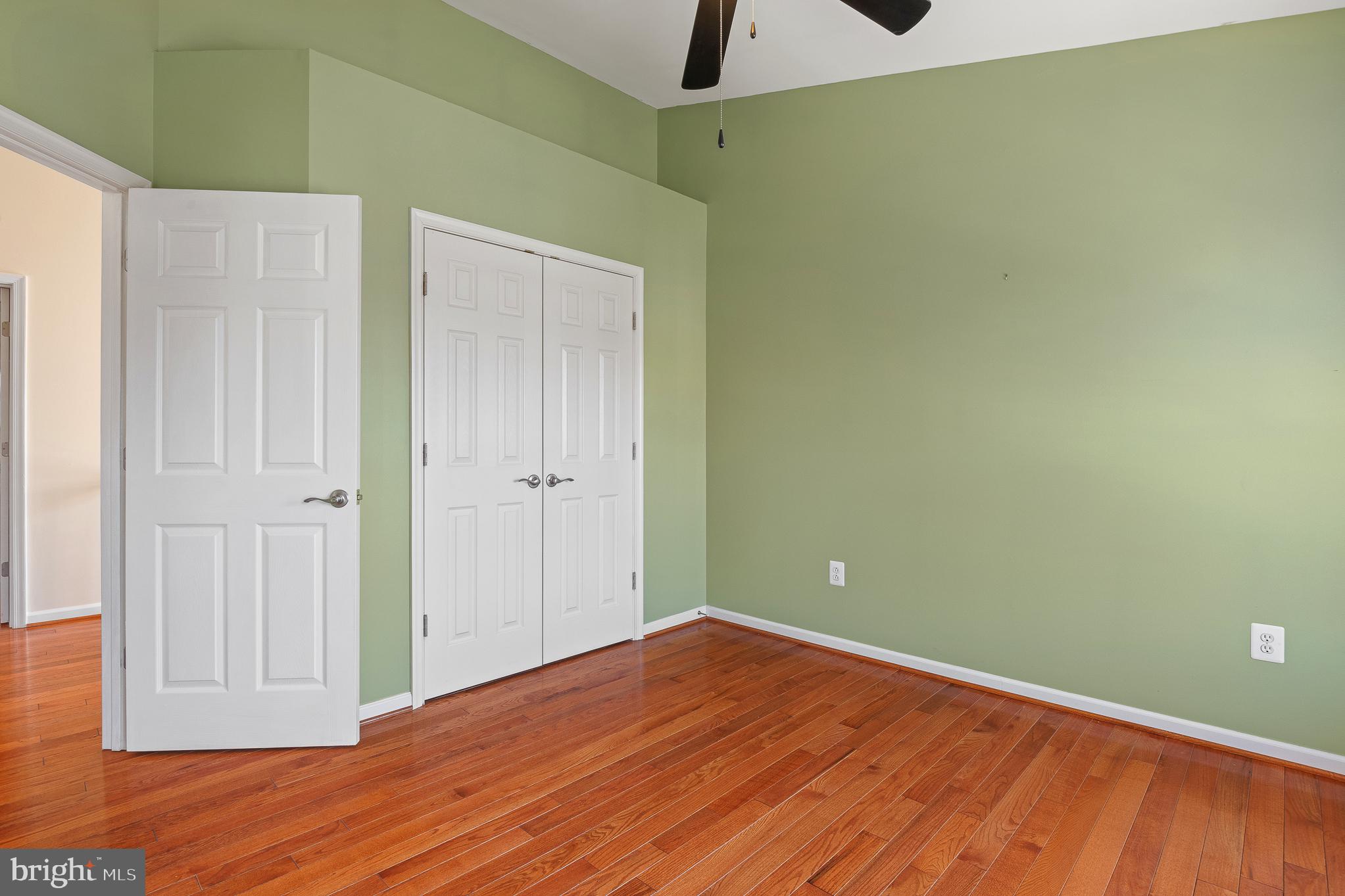 70 Two Rivers Drive Edgewater, MD 21037 - Photo 57 of 69 Bright and airy room with green walls.