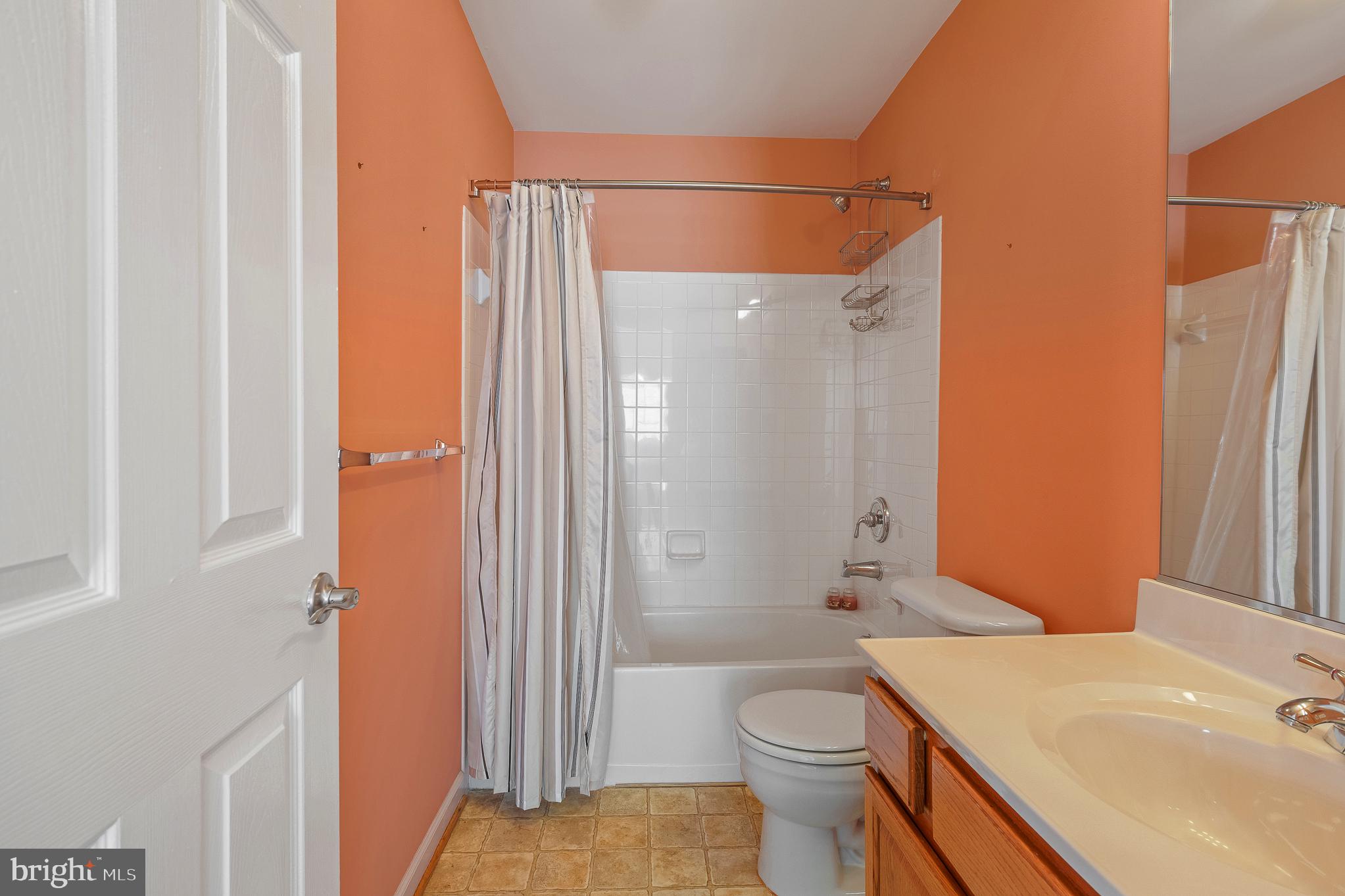 70 Two Rivers Drive Edgewater, MD 21037 - Photo 58 of 69 Vibrant bathroom with modern touches.