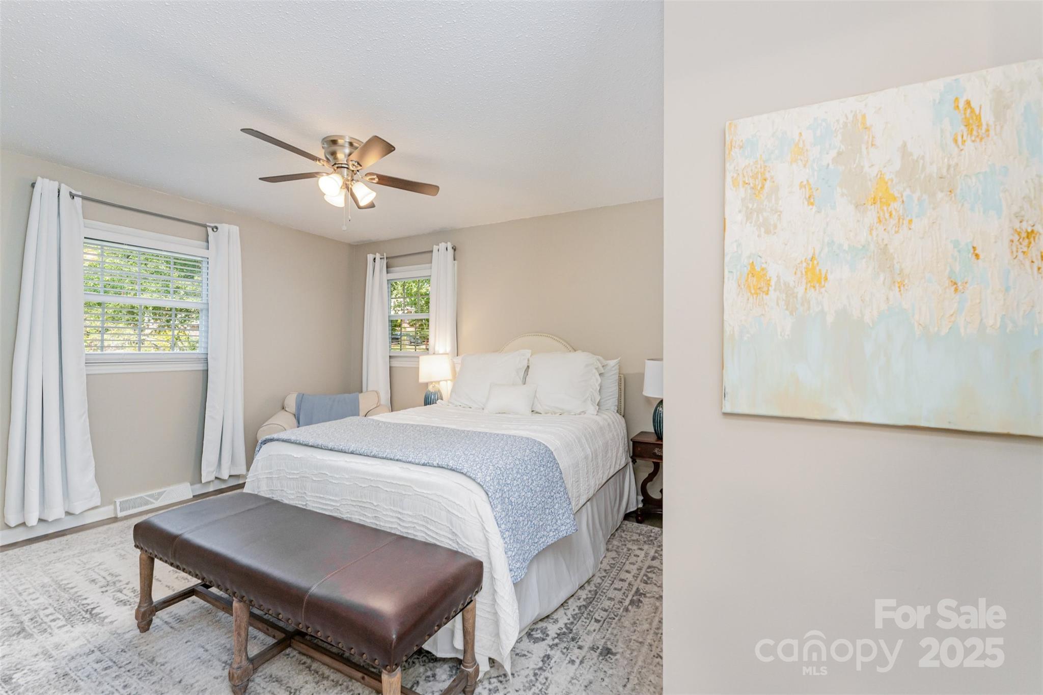 743 Pineborough Road Charlotte, NC 28212 - Photo 13 of 30 a spacious bedroom with a bed and a window