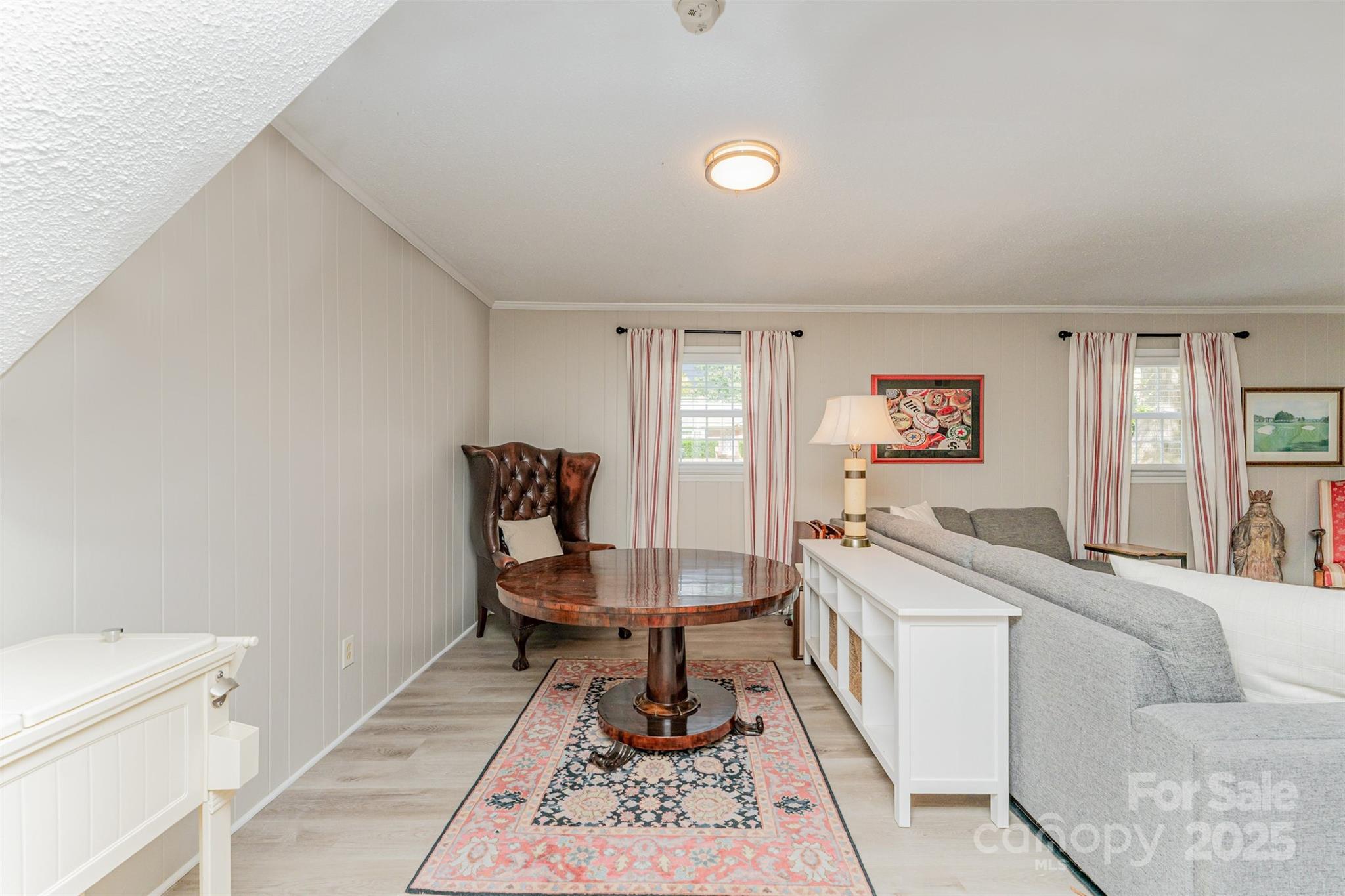 743 Pineborough Road Charlotte, NC 28212 - Photo 19 of 30 a living room with furniture and a rug
