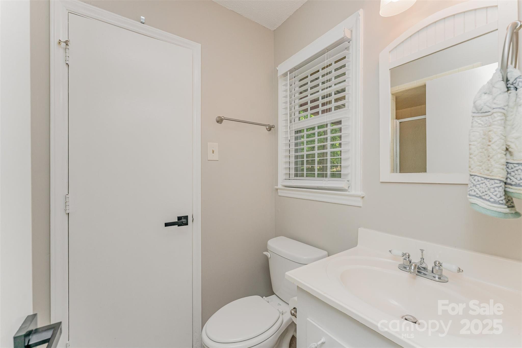 743 Pineborough Road Charlotte, NC 28212 - Photo 23 of 30 a bathroom with a sink toilet and shower