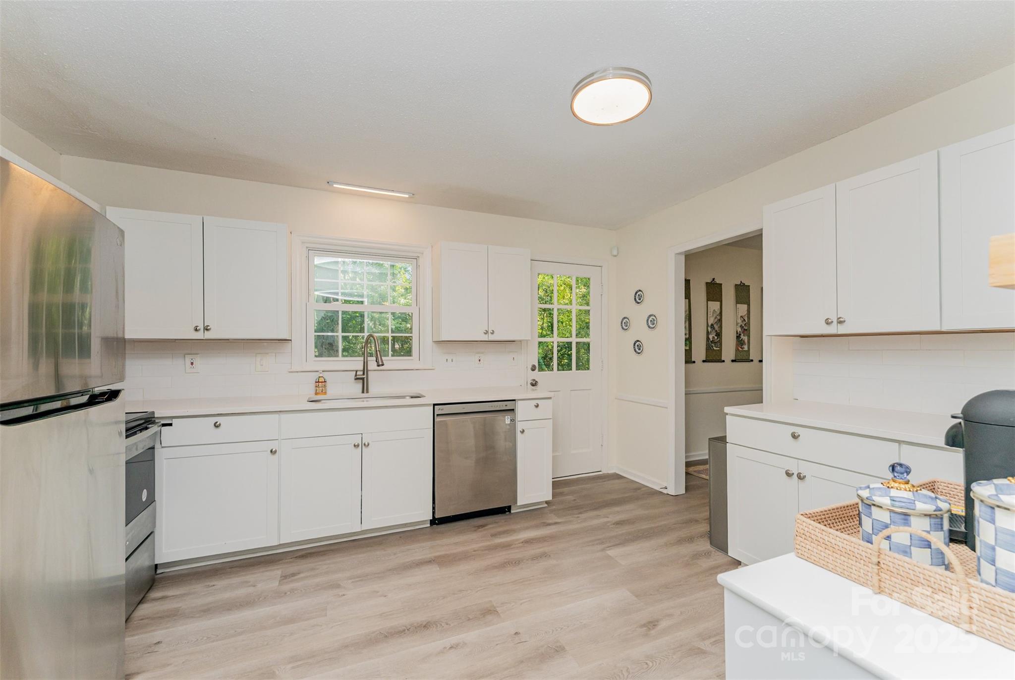 743 Pineborough Road Charlotte, NC 28212 - Photo 8 of 30 a kitchen with a sink stove top oven and cabinets