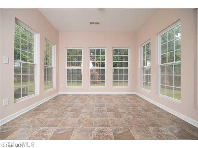 1315 Sharp Ridge Road Greensboro, NC 27406 - Photo 7 of 16 Sunroom.