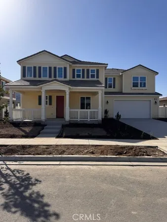 a view of a house with a street