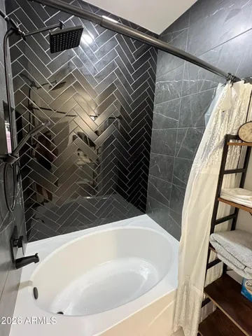 a bathroom with a bathtub