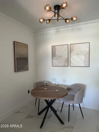 a view of a workspace with furniture