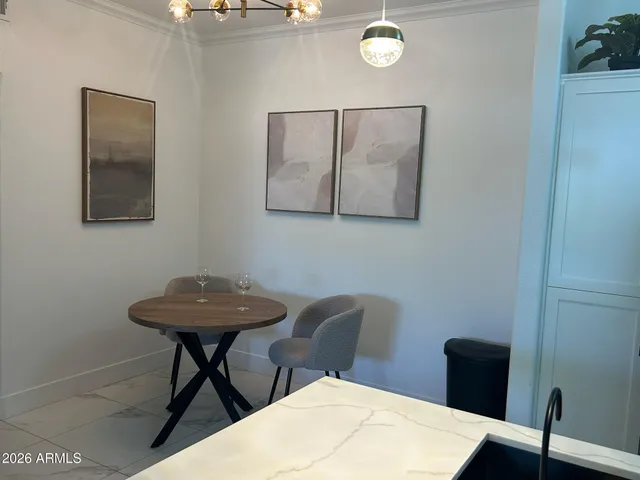 a bathroom with a sink a mirror and a toilet