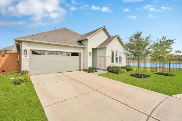 a front view of a house with yard