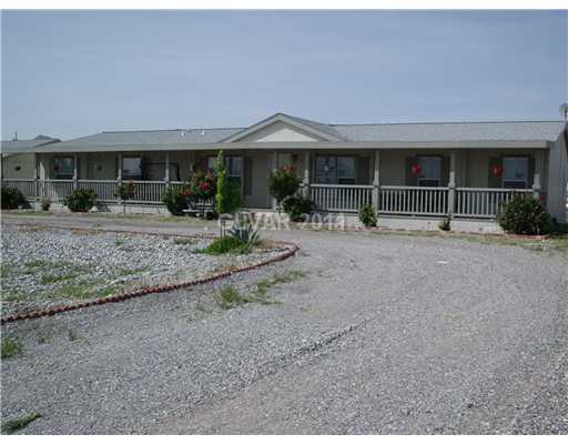 3850 Horn Road Pahrump, NV 89048 - Photo 1 of 1 Property Photo. FRONT PORCH ACROSS THE WHOLE HOUSE, WONDERFUL VIEWS!