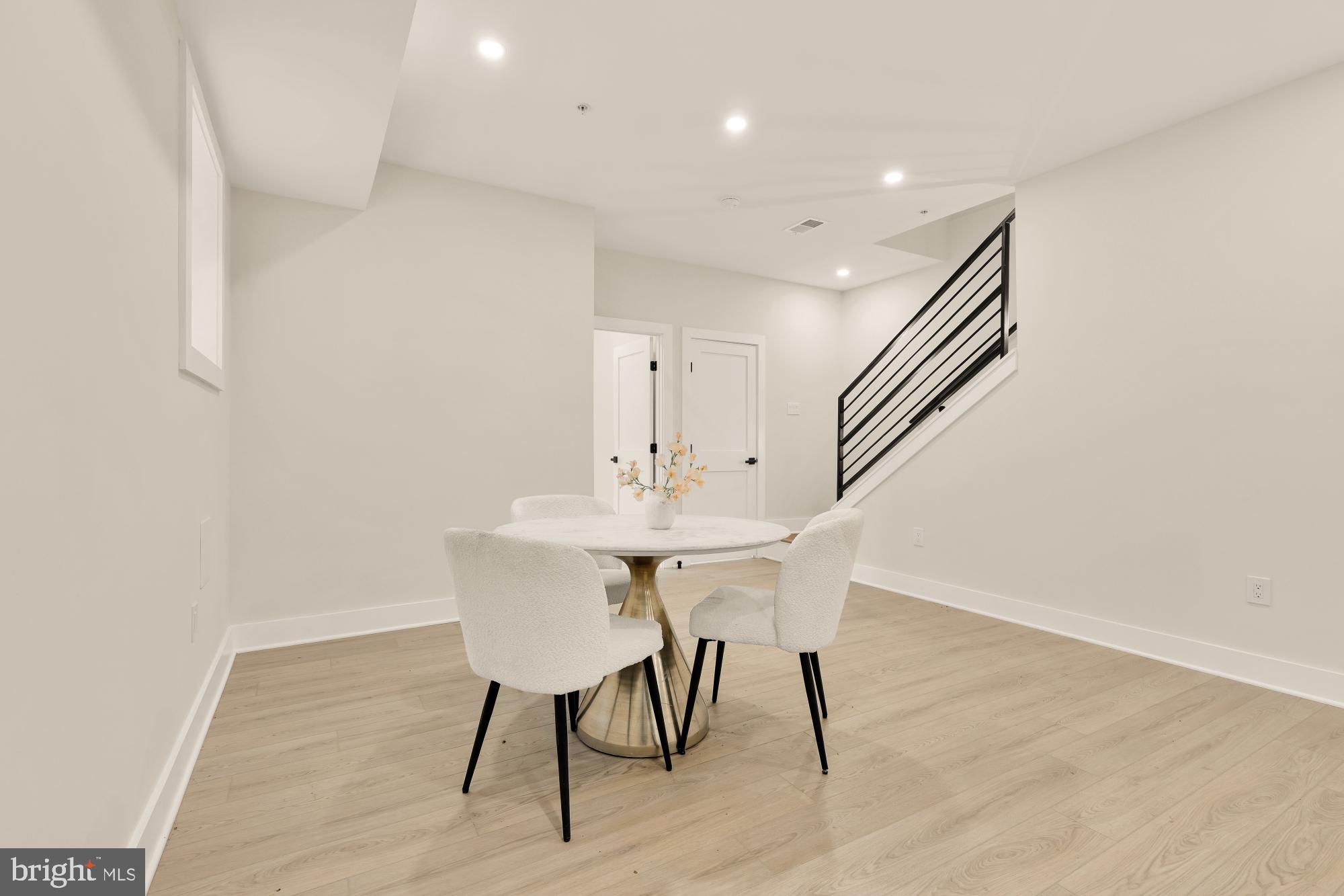 1631 G Street Southeast Washington, DC 20003 - Photo 35 of 42 a view of a dining room with furniture and wooden floor