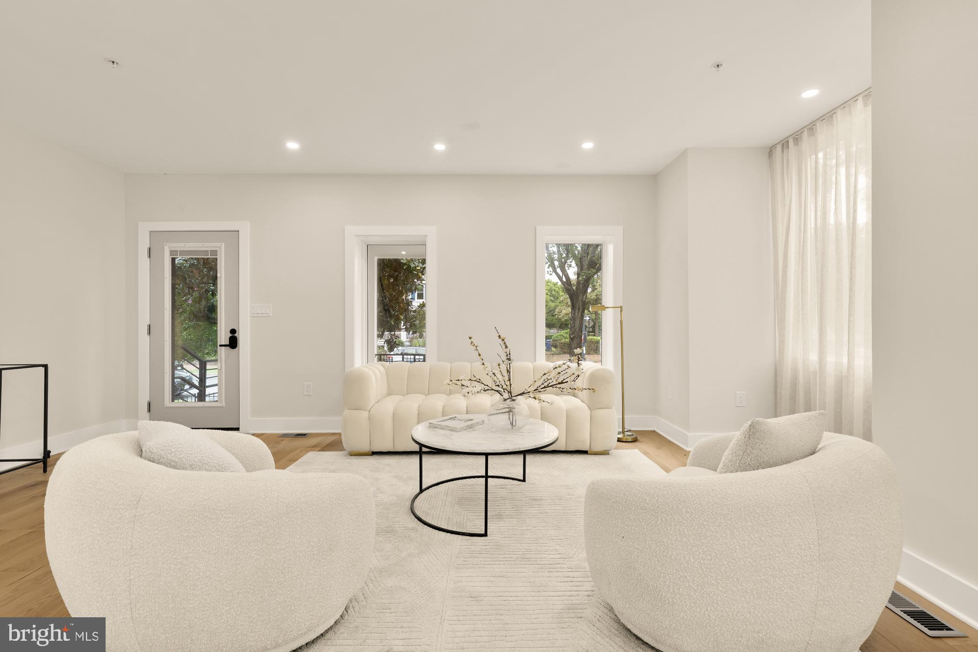 1631 G Street Southeast Washington, DC 20003 - Photo 7 of 42 a living room with furniture and a large window